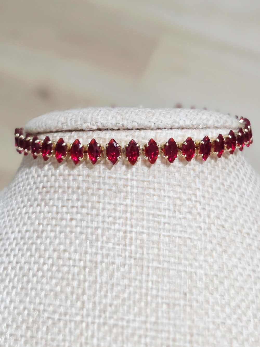 Gold Bracelet with Red Marquise Stones